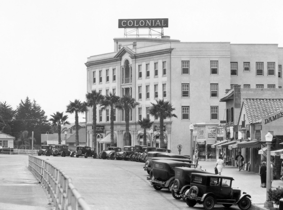 Prospect-Street-in-Late-1920s a black and white image of the Colonial hotel in the 1920s with cars parked along the curb of Prospect street