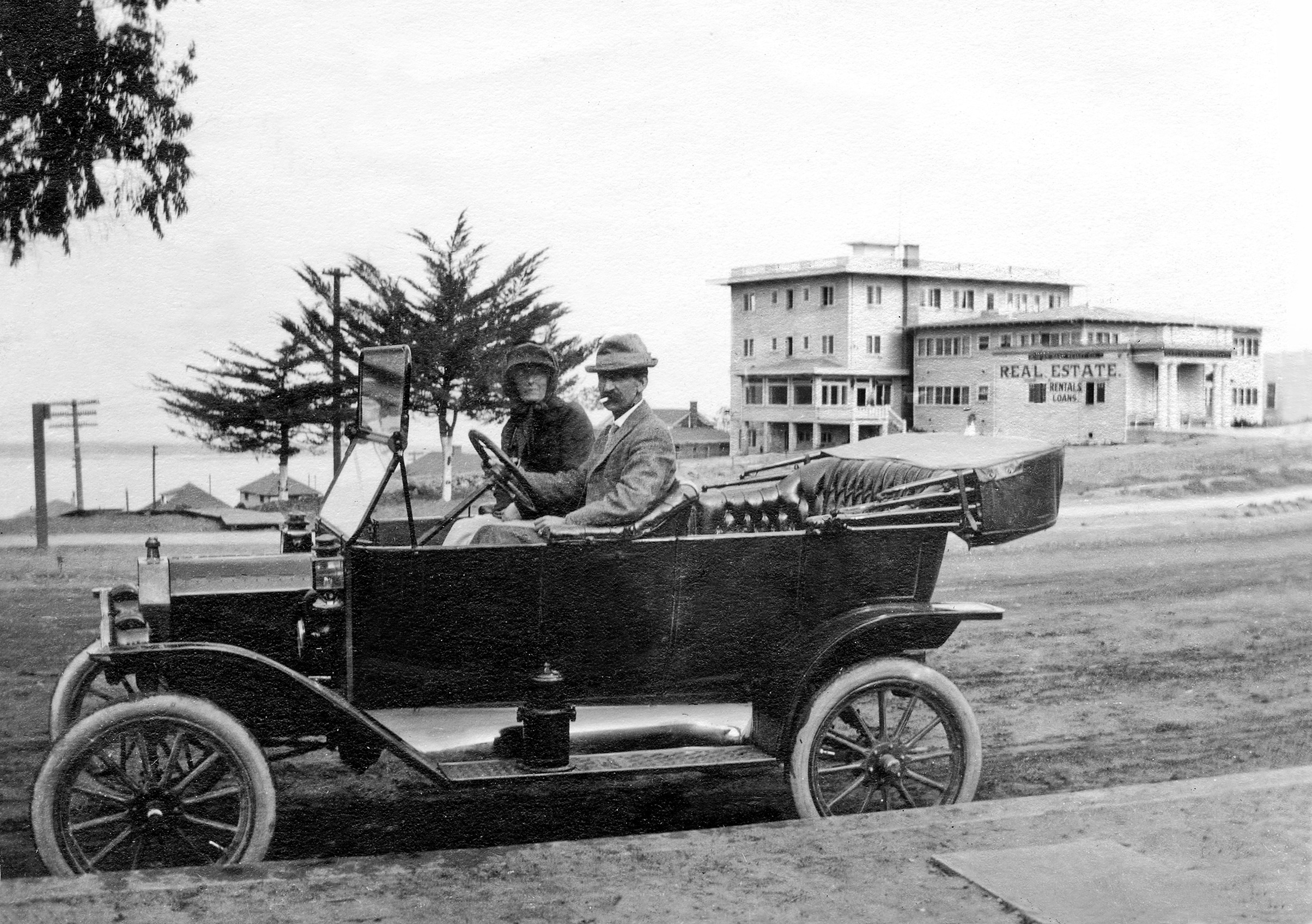 Mr. & Mrs. Anson Mills in front of the Colonial Hotel. 1918