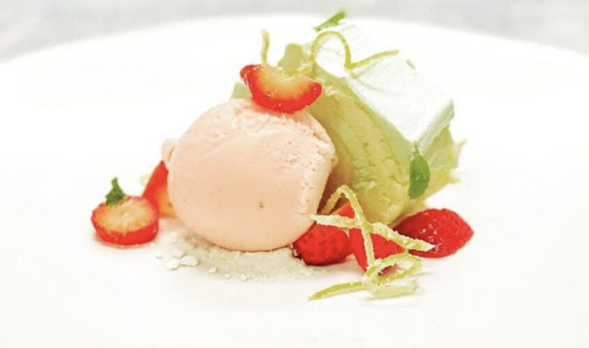 NINE-TEN White Chocolate Pistachio Cake with Strawberry Buttermilk Ice Cream and White Chocolate Powder