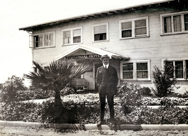 Karl Kenyon, one of George Bane's partners, in front of the Colonial soon after opening in 1913