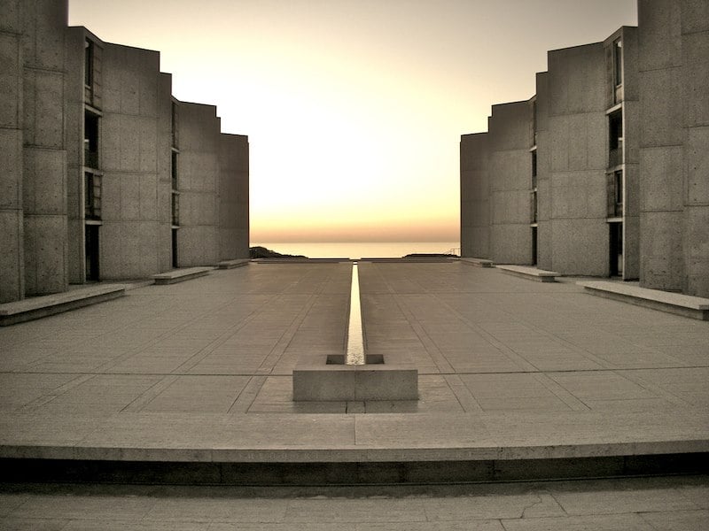 fountain at the salk institute at sunset