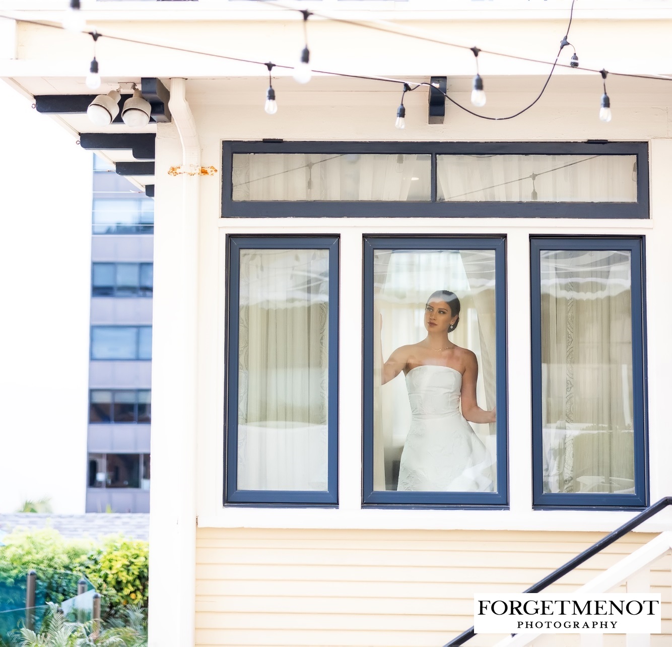 Bride looking out of window