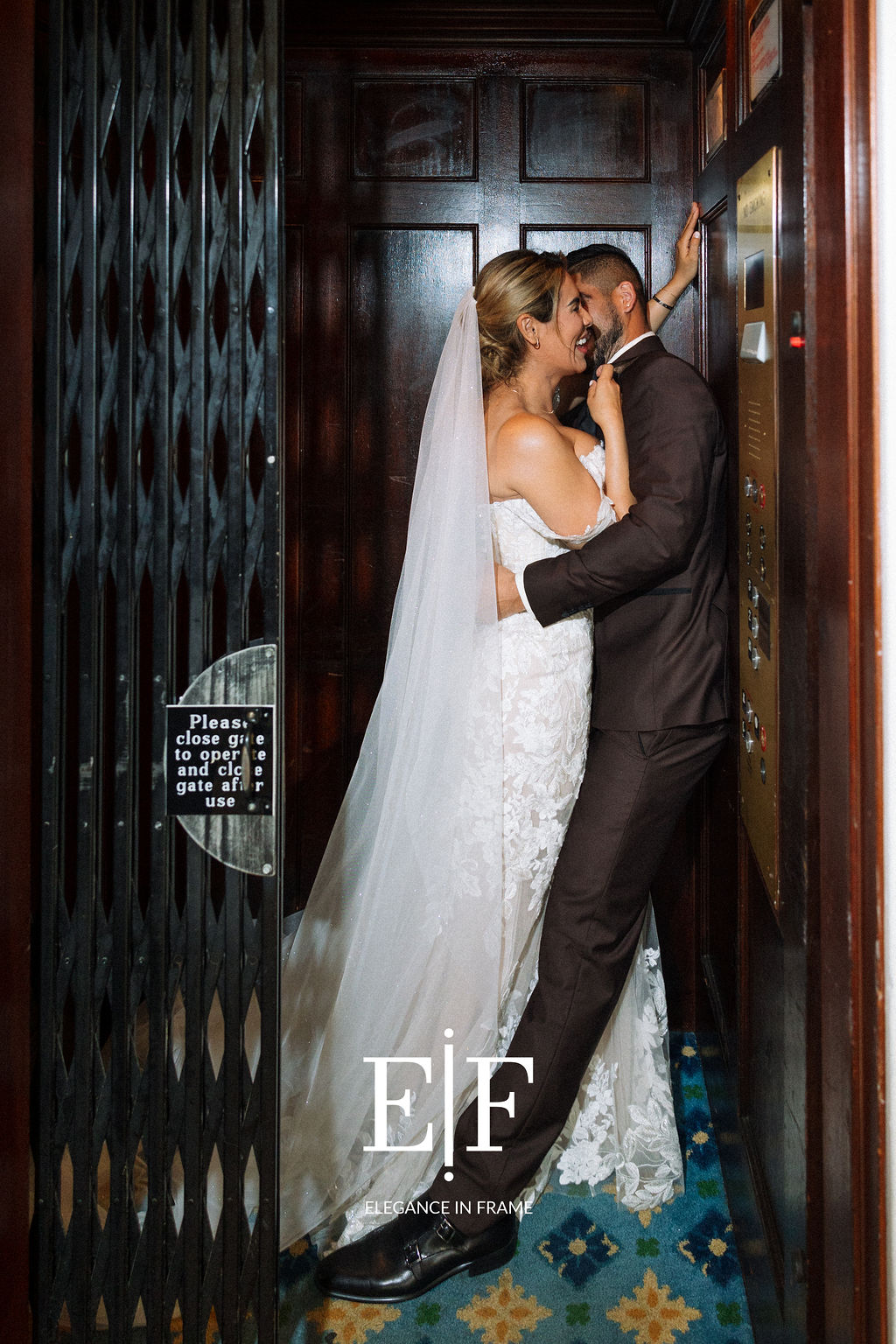 Bride and Groom Kissing in Elevator