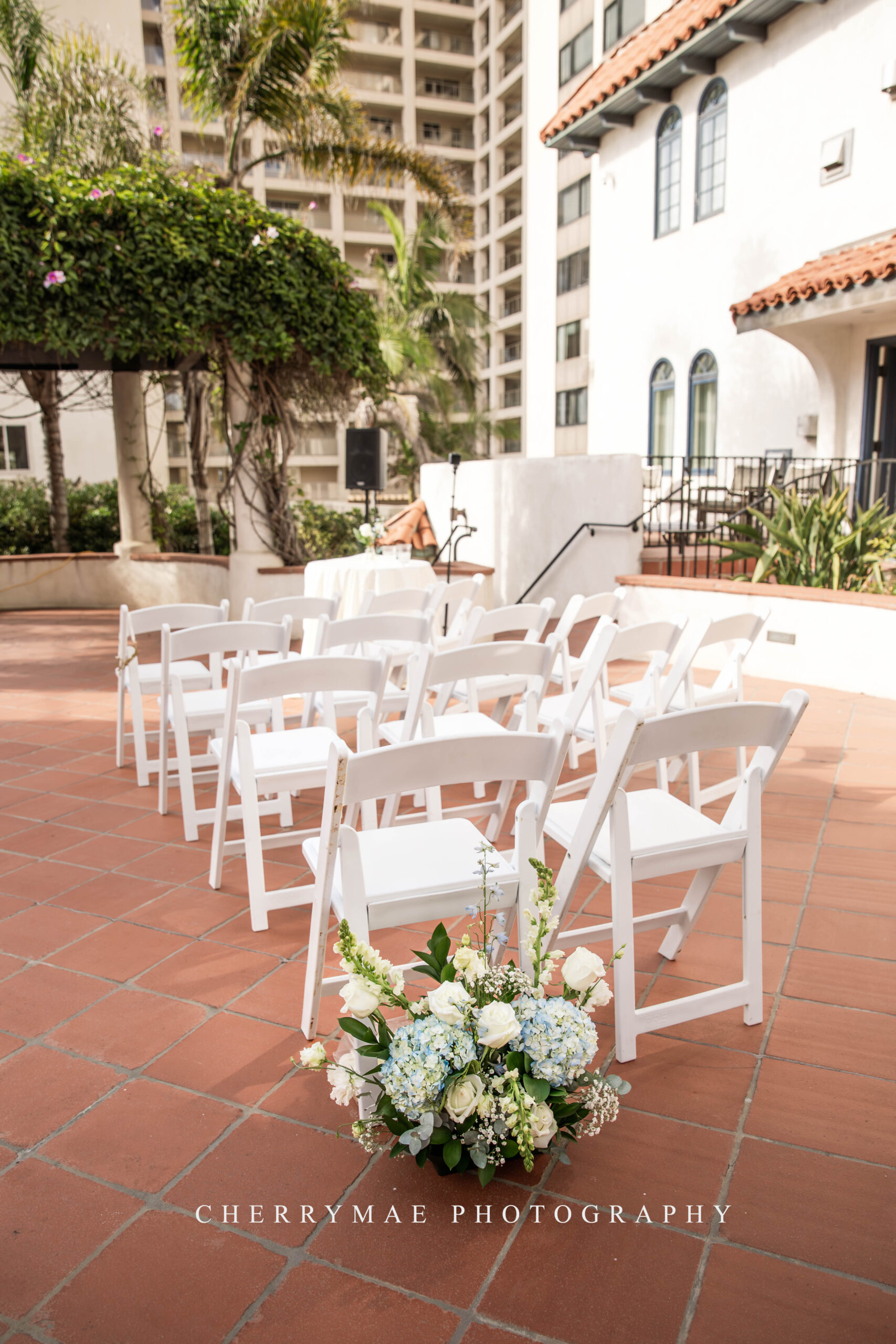 photo of chairs set up at wedding ceremony